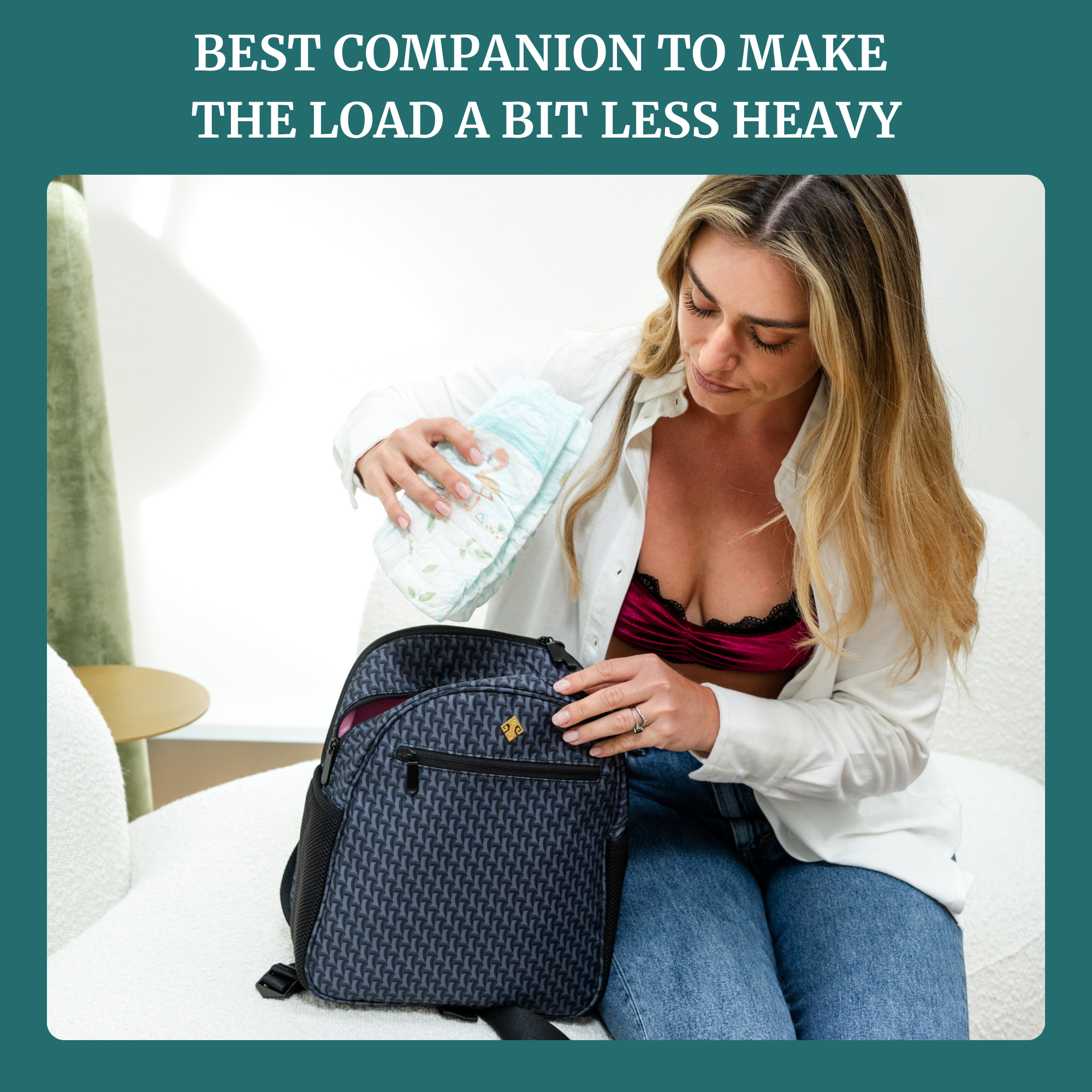 Woman using the small diaper bag backpack Claremont to store baby essentials while sitting.