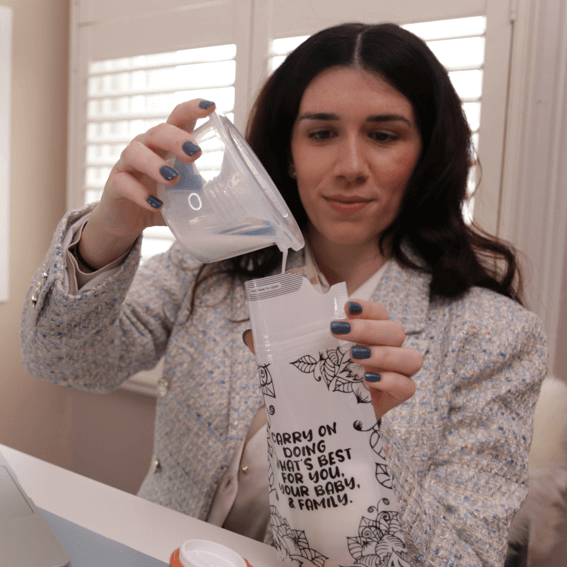 mom confidently pouring the pumped milk from the collection cup to the idaho jones breast milk storage bag