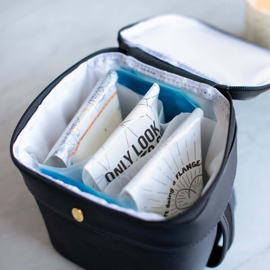 idaho jones breastmilk storage bags filled with pumped milk placed on the roxwell cooler bag