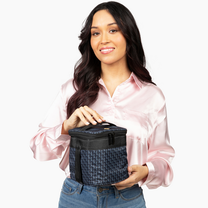 happy woman holding the roxwell breast milk cooler bag