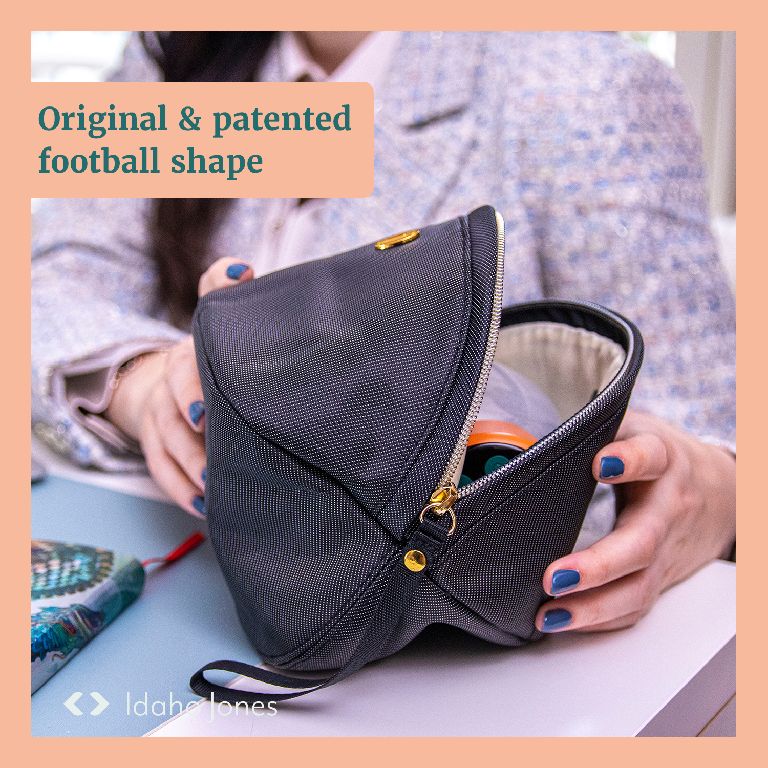 Wearable pump bag in original football shape, showcasing style and convenience for breast pumps.