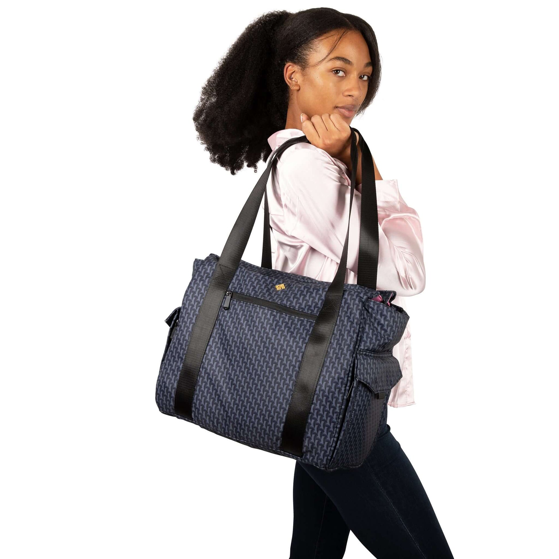 boss mom proudly carries her ellerby tote bag on her shoulder