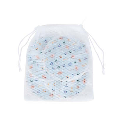used reusable nursing pads inside the laundry bag, ready for machine washing without getting mixed up with other clothes