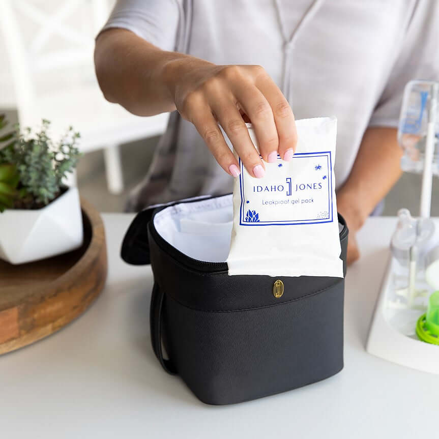 mom showing the jamie reusable gel ice pack before placing it in the roxwell cooler bag